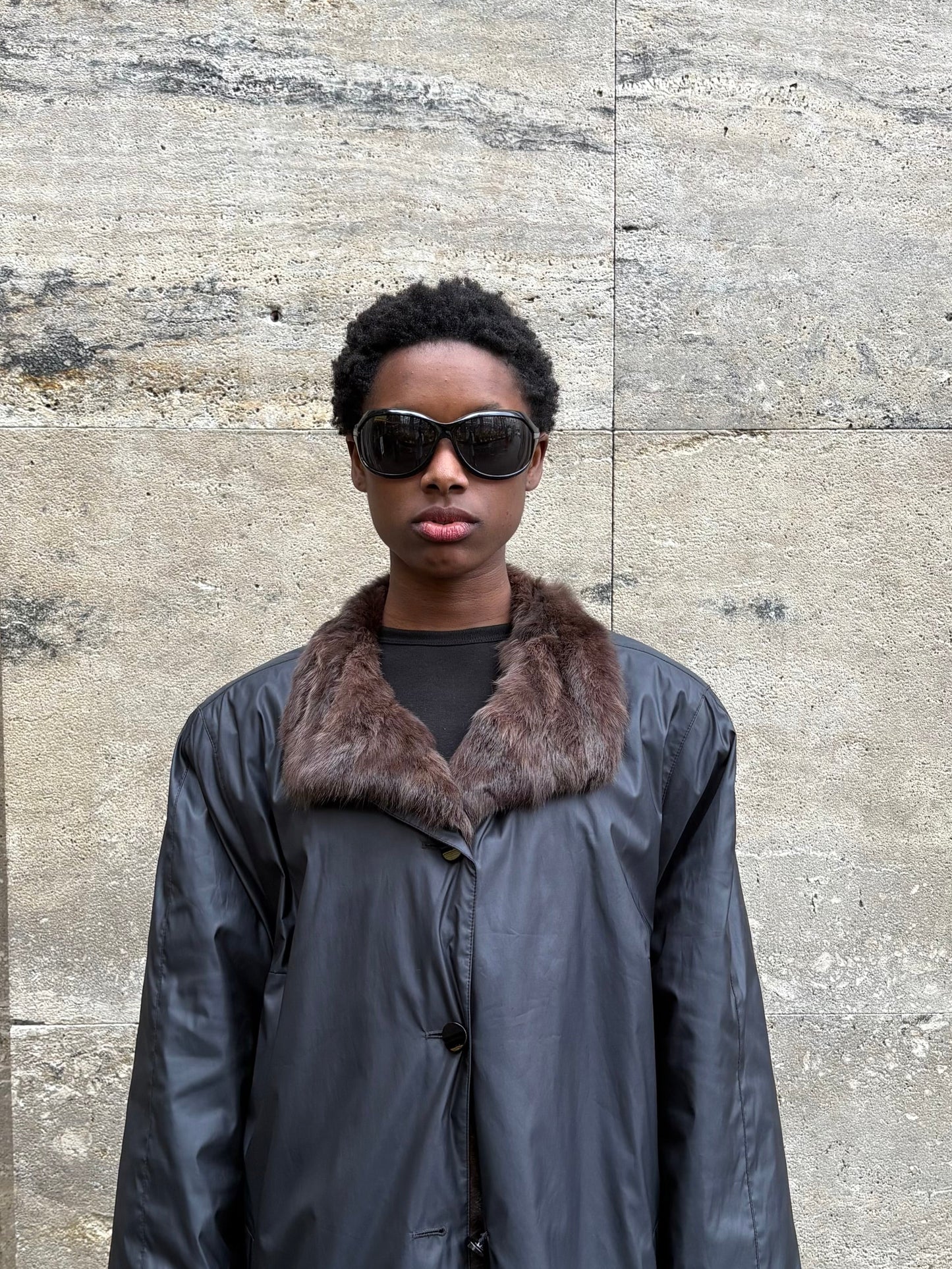 RAINCOAT WITH FUR DETAILING